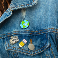 enamel pins on denim jacket